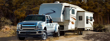 An image of a truck towing an RV