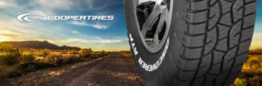 Cooper exclusive tire: Cooper Discoverer ATP II on a dirt road