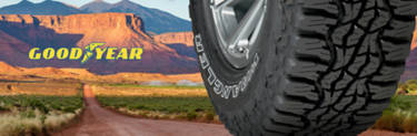 Goodyear exclusive tire: Goodyear Wrangler Ultraterrain AT on a sunset dirt road