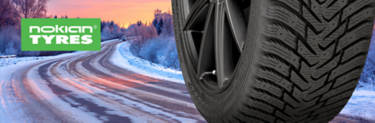 Nokian exclusive tire: Nokian Encompass AW01 on a sunset snowy road