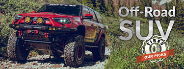 toyota 4runner suv crawling up a rocky trail with all-terrain tires