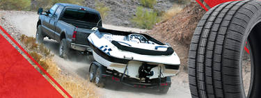 an image of a truck hauling a boat up a hill with a large image of a trailer tire to the right and red triangle borders around the edges of the image