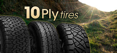 3 10-ply tires in a row on a hill