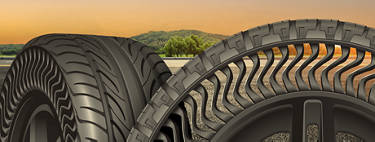 An image of airless tires with a background of a sunset .