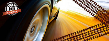 An image of a vehicle going fast with a zoom in on the back tire turning with a blurred background. Graphics of two tire tracks crosscross on the right and the words and tire insignia of 'Tires: Our Picks' is on the left.