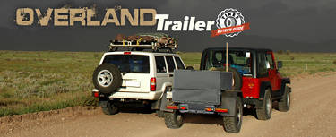 a picture of two vehicles, one towing a trailer with all terrain tires down an open country road with the words 'overland trailer tires: buyer's guide' written across the top.