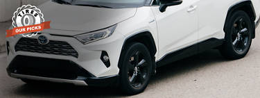 An image of a white CUV and the 'Tires: Our Picks' logo at the top left.