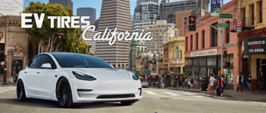 Best EV Tires for California, white tesla on a corner in the city