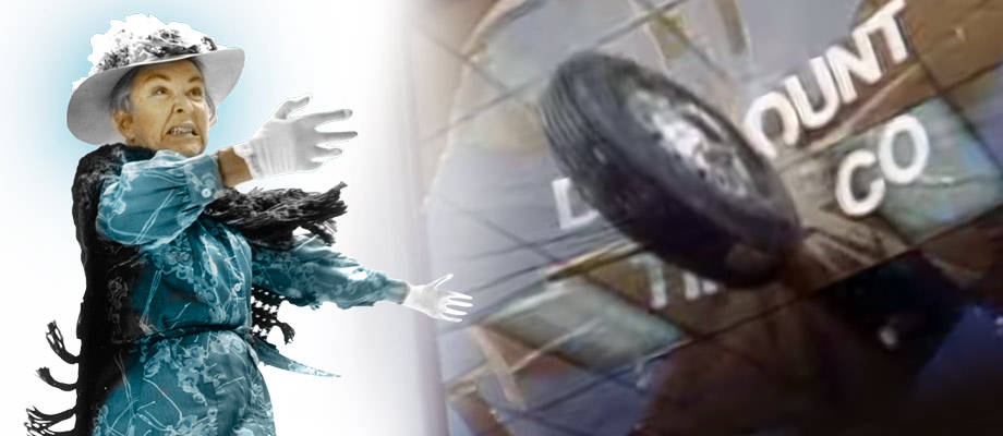 little old lady throwing a tire