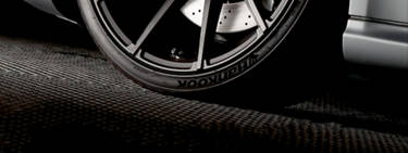 a close up of a sports car wheel with low profile Hankook tires.