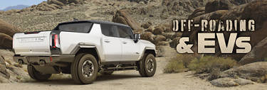 GMC Hummer EV with AT tires on a rocky trail