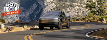 cybertruck traveling down a winding road
