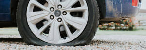 an image of a flat tire on a vehicle