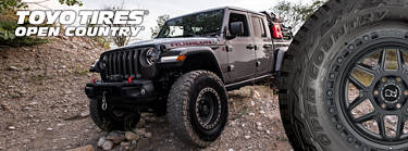 Jeep Wrangler With Toyo Open Country tires on a dirt trail