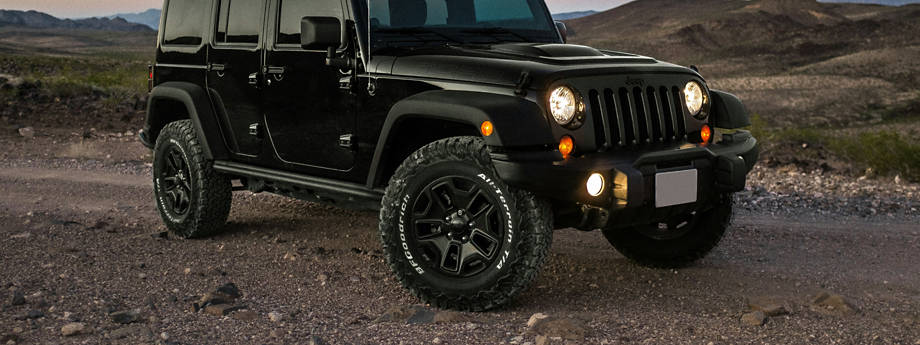 Jeep on a trail at night