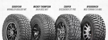 An image of the treads of four rock crawling tires, the BFGoodrich Mud Terrain T/A KM3, Goodyear Wrangler Boulder MT, Cooper Discoverer STT PRO, and the Mickey Thompson Baja Boss M/T with their titles written above them.
