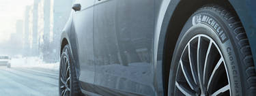 An image of tires stacked side by side in blue outline.