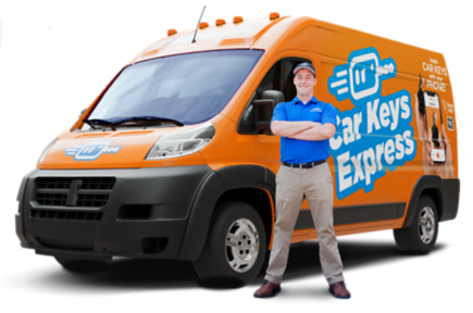 Car Keys Express tech standing in front of his van