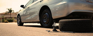 silver car with spare