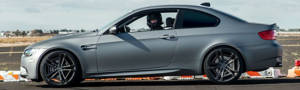 Driver in car on racetrack
