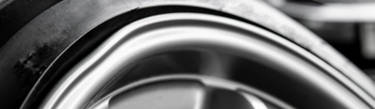 Close up of a bent rim of a wheel in need of repair