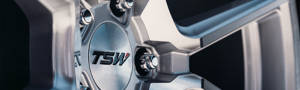 Close up of lug nuts installed at the center of a TSW wheel