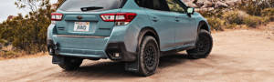 Subaru Crosstrek AWD driving around a dirt road