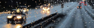 wet road through a car window