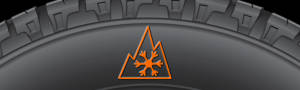 orange mountain snowflake symbol on a tire