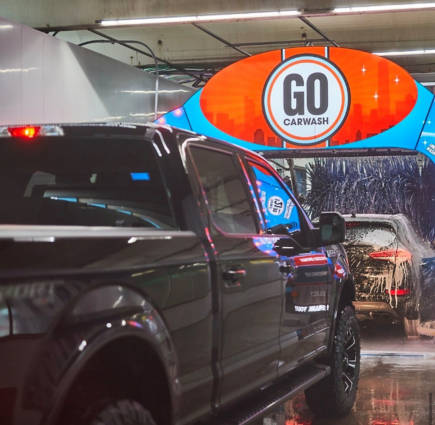 Pickup truck in a GO Carwash