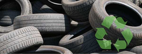 A pile of worn out tires ready to be recycled.