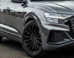 All-Season Tires on a grey Audi