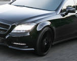 Touring Tires on a dark passenger car