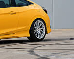 Mesh Wheels on a small yellow vehicle