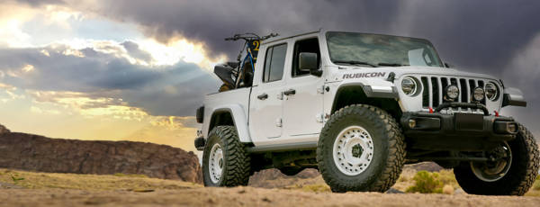 White Jeep Rubicon featuring white painted wheels