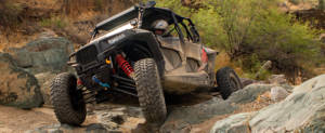 ATV driving over rocks