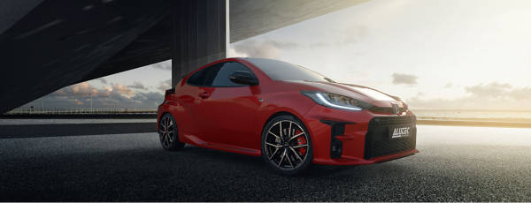 Red car with Alutec wheels