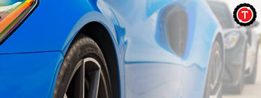 An image of a blue vehicle on a racetrack with the Treadwell logo in the top right corner.