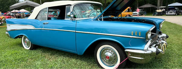 Classic blue coupe featuring Coker tires