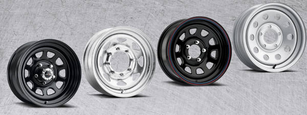 An image of a variety of steel wheels positioned against a grey background.