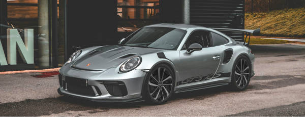 Porshe 911 parked on the side of the road